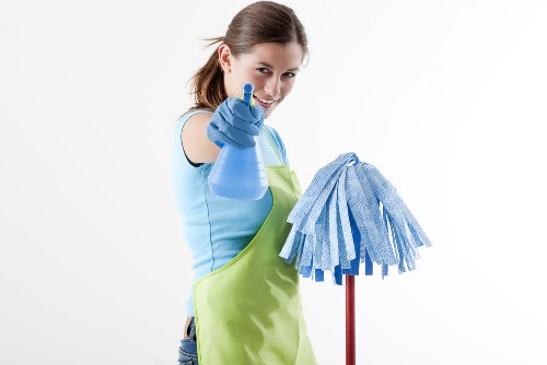 Person using an accessible website for carpet cleaning services in Tooting Bec