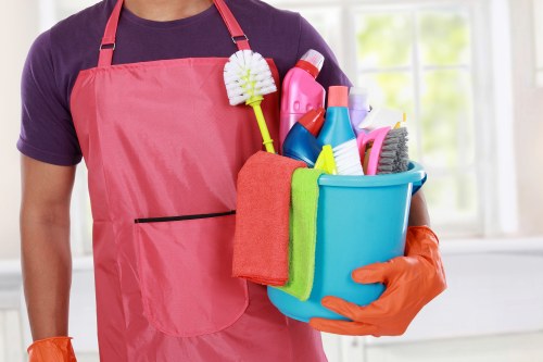 Carpet cleaning team preparing equipment safely before work